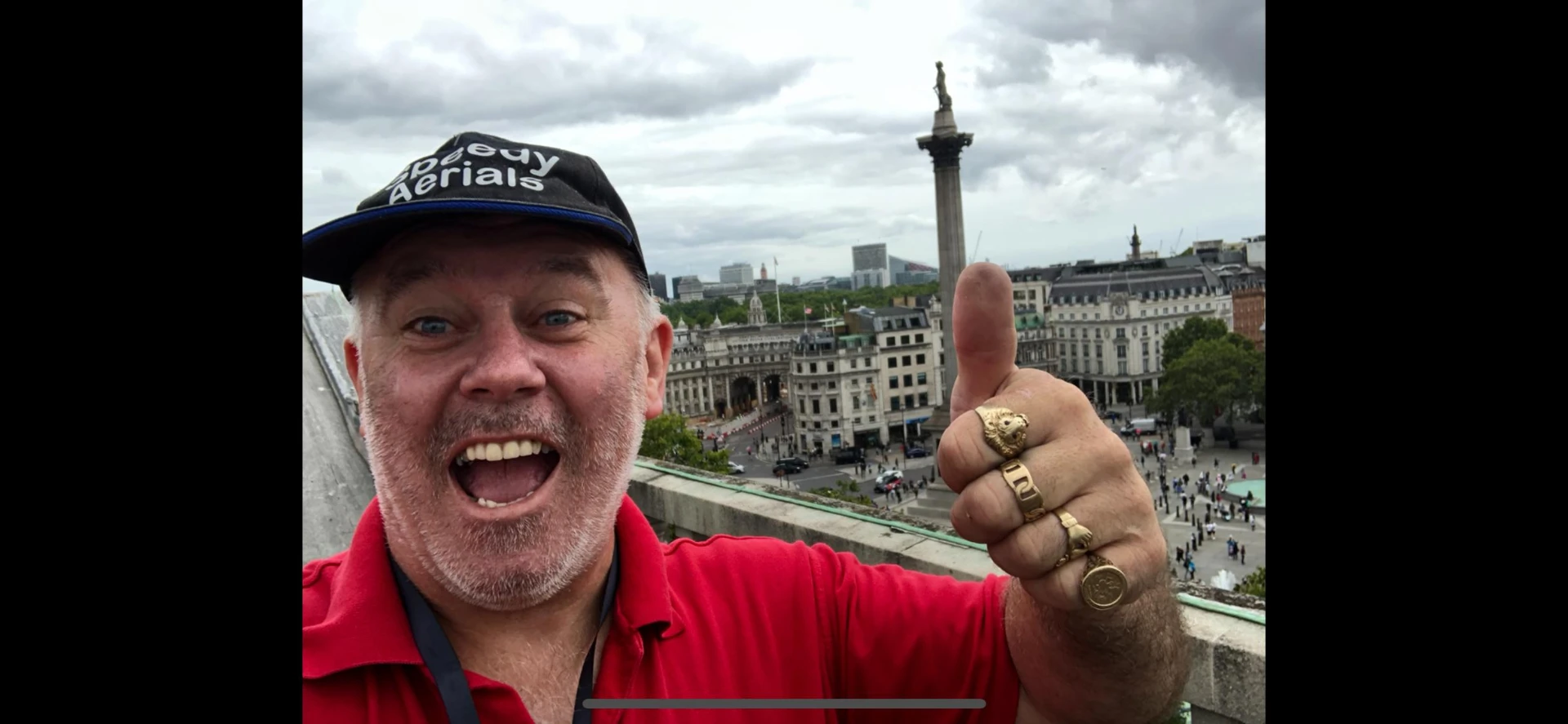 Larry in a Speedy Aerials cap on the roof of the South African High Commission overlooking Trafalgar Square and Nelson's Column